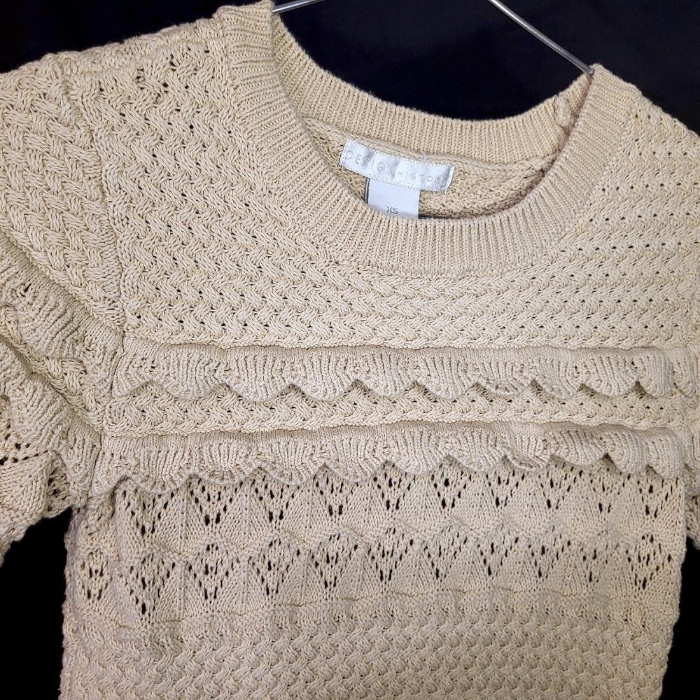 A Cozy Cream Color Knitted Sweater